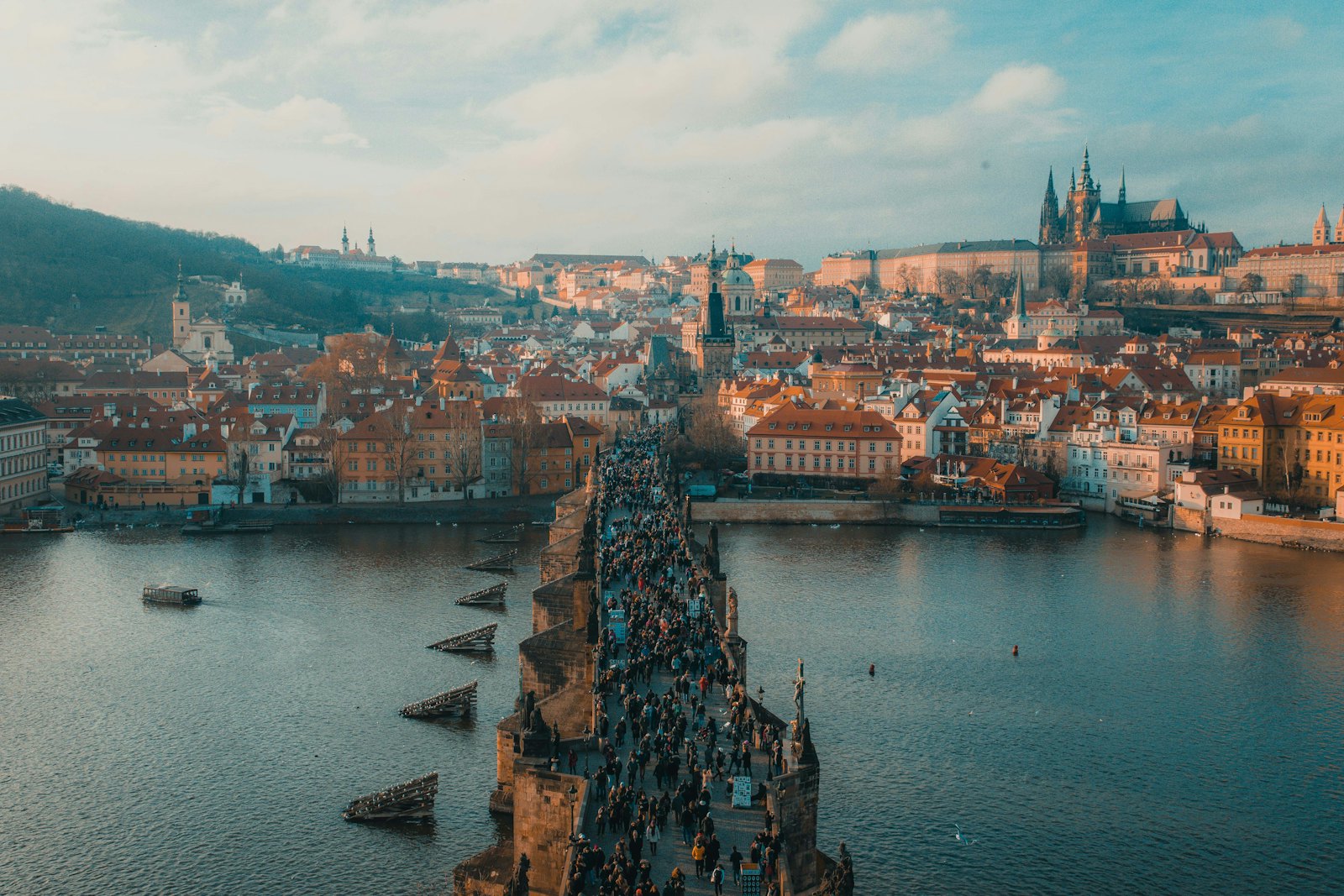 Aerial view of Prague's Old Town and the Vltava river at golden hour
