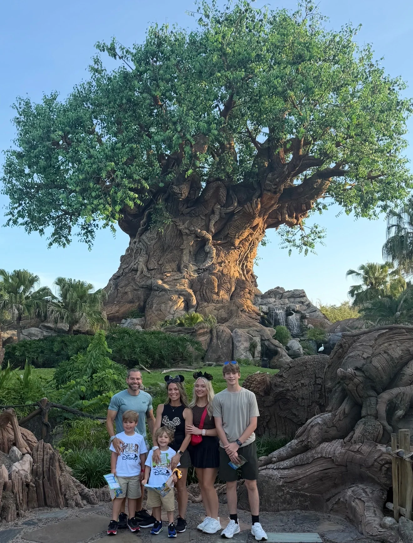 Krissy and her family standing in front of the Tree of Life at Disney's Animal Kingdom