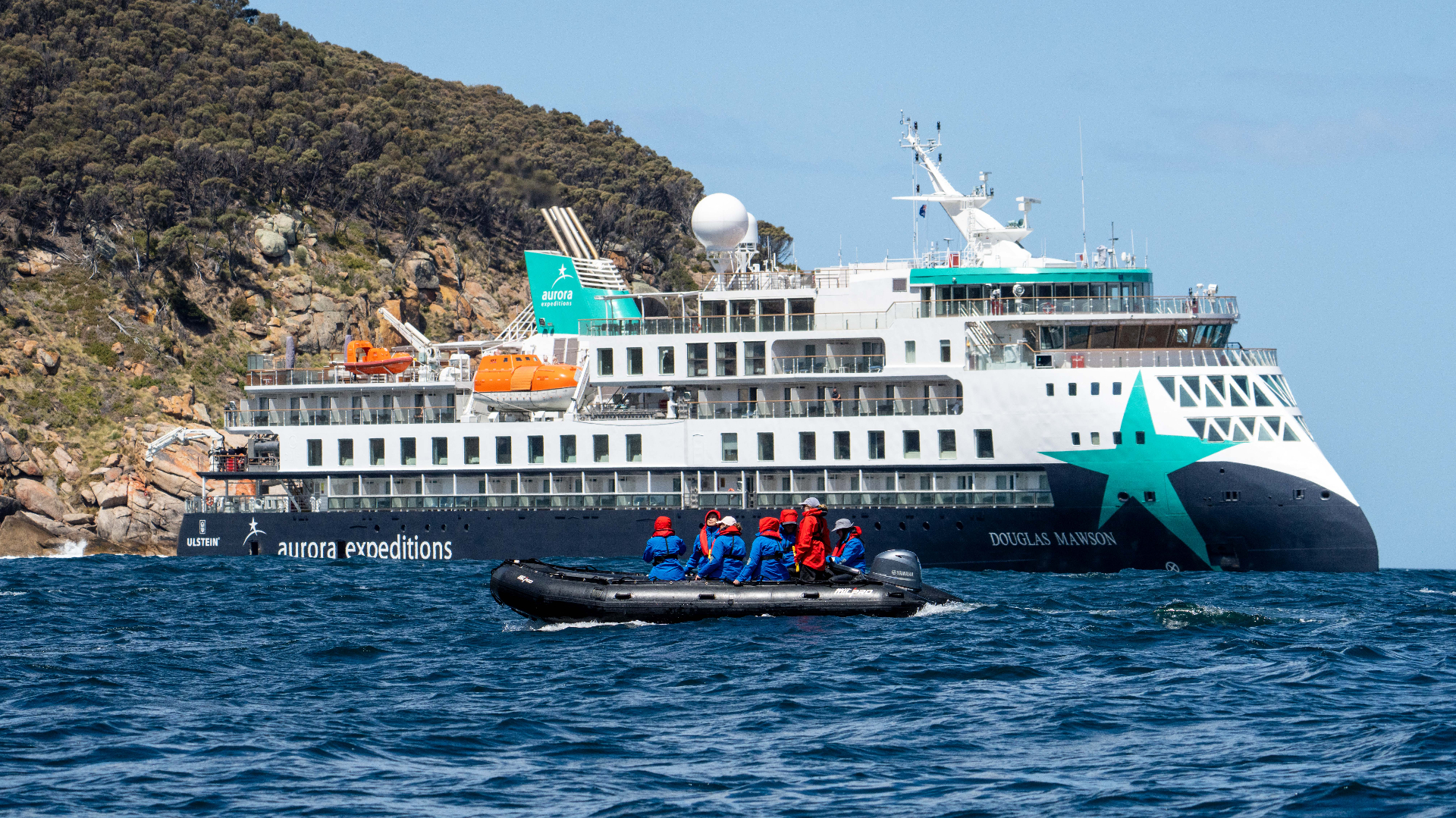 Guests on a Zodiac excursion near Aurora Expeditions' Douglas Mawson in Tasmania