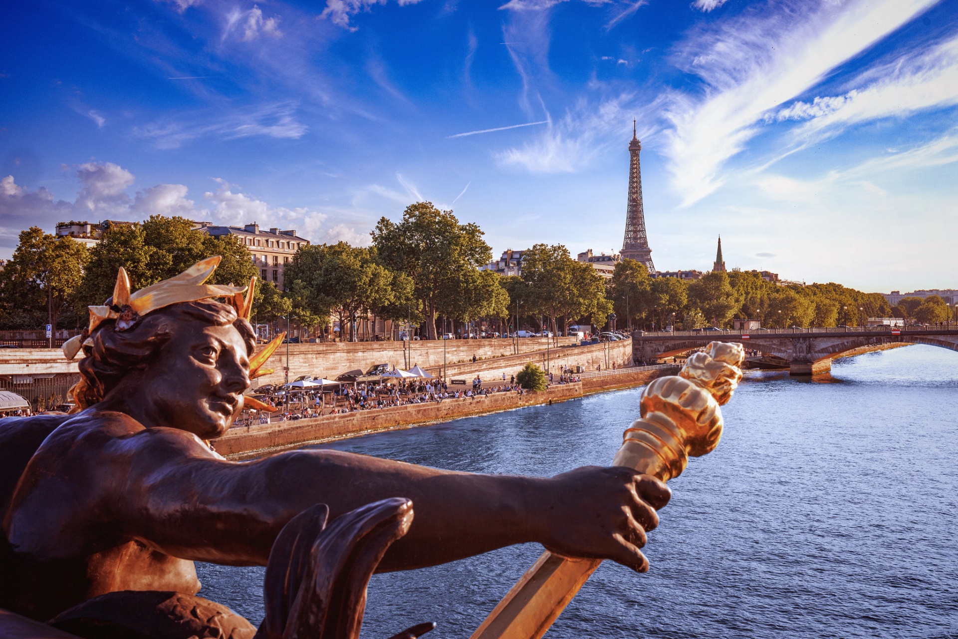 The Seine river in Paris with the Eiffel Tower in the distance